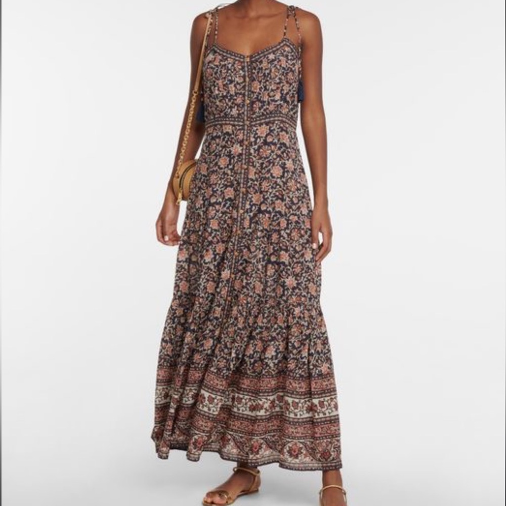 This beautiful dress is available w/o tags, but it’s never been worn.